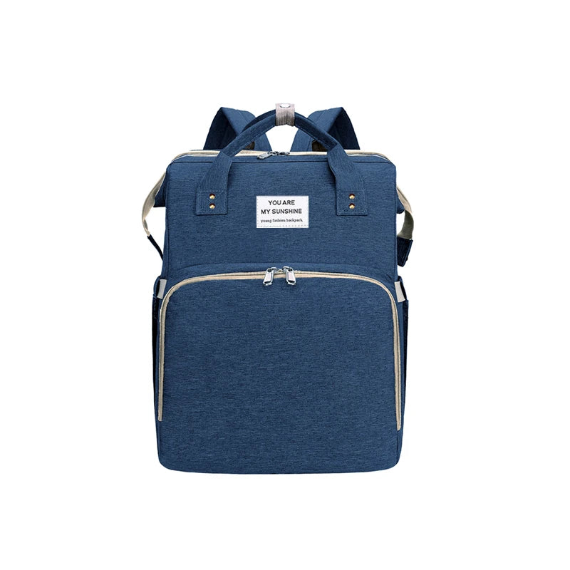 BabyCare – Mochila Multifuncional para Mamá y Bebé con Cuna Plegable y Red Antimosquitos